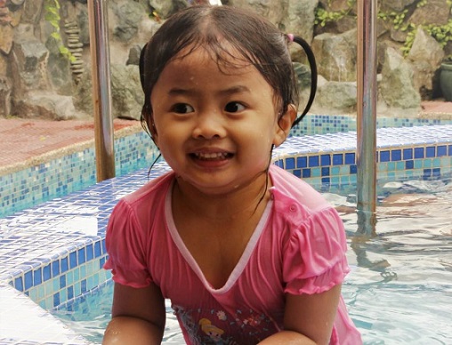 Maggie, a beautiful Filipino child. Happy a smiling, like all Filipino kids.