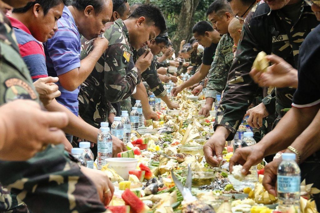 A boodle fight where hygiene goes out the window